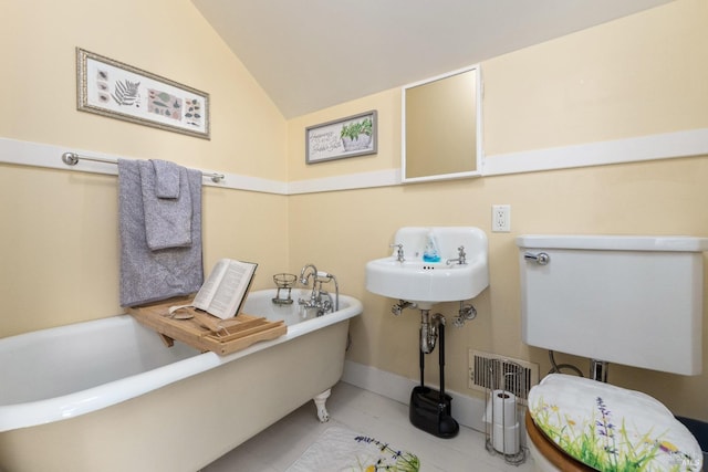 825 N Forbes St, Lakeport, CA 95453 - bathroom featuring tile patterned floors, lofted ceiling, toilet, and a bathtub