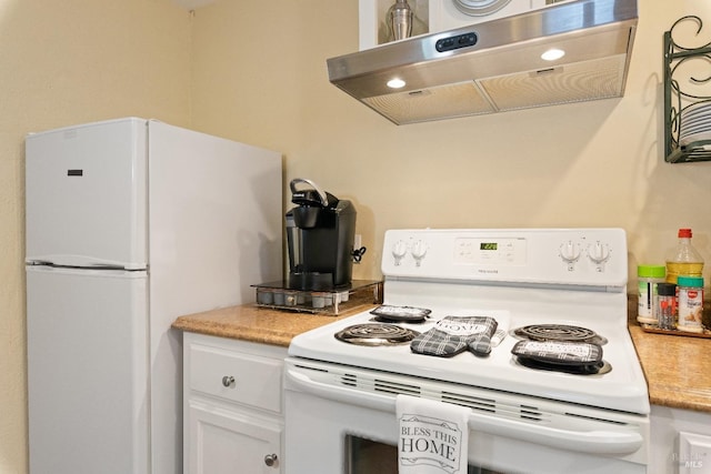 825 N Forbes St, Lakeport, CA 95453 - kitchen with white cabinetry, white appliances, and extractor fan