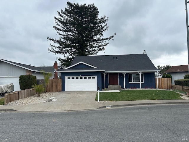 single story home with a garage and a front lawn