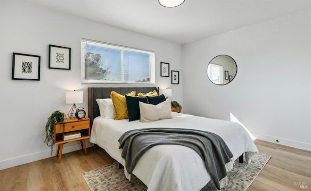 bedroom featuring light wood-type flooring