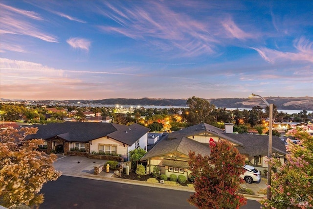 aerial view at dusk with a mountain view