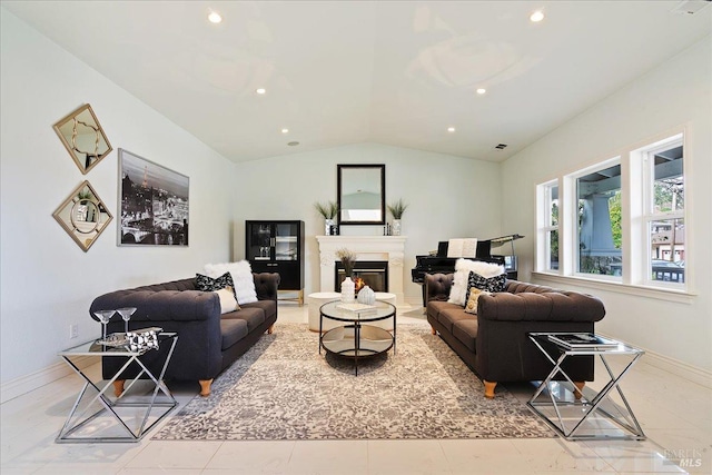 living room with light tile patterned flooring and lofted ceiling