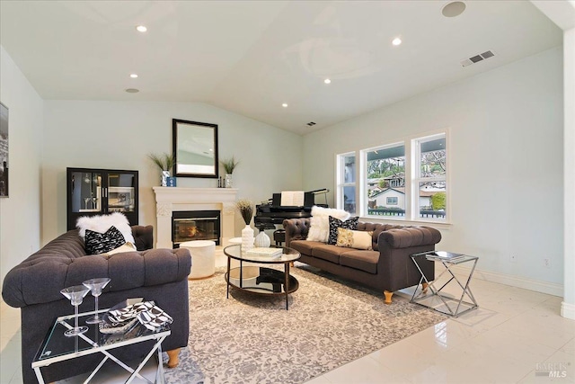 living room with lofted ceiling