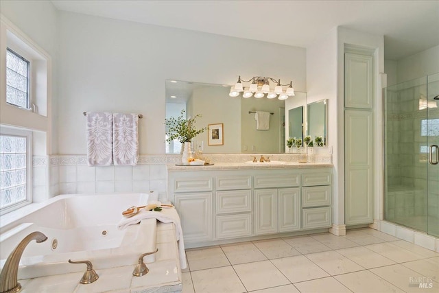 bathroom featuring vanity, plus walk in shower, and tile patterned flooring