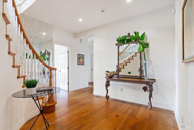 entrance foyer featuring light hardwood / wood-style floors