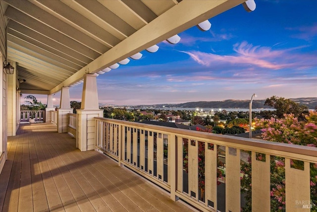 balcony at dusk with a mountain view