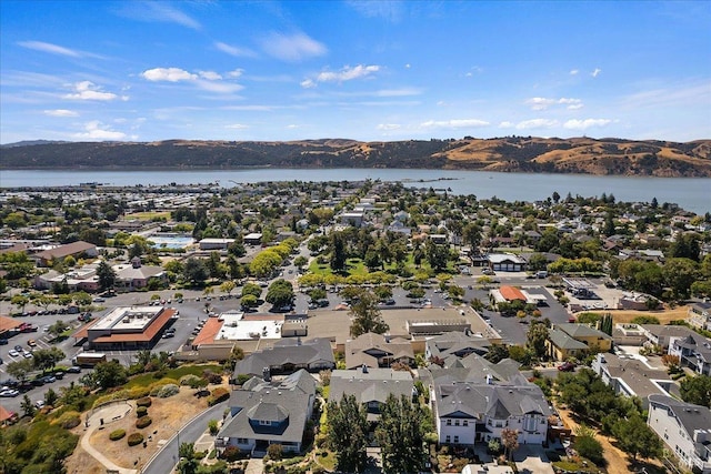 bird's eye view featuring a water and mountain view