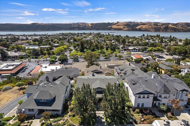 bird's eye view featuring a water and mountain view