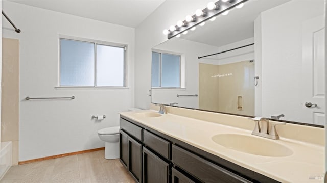 full bathroom with vanity, shower / washtub combination, and toilet