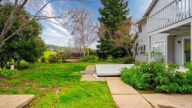 view of yard with a deck