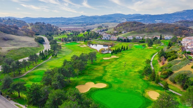 bird's eye view featuring a water and mountain view