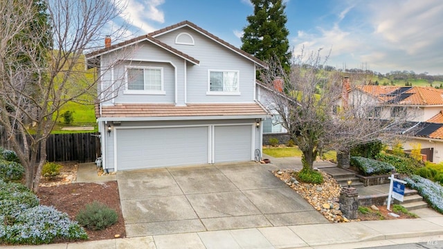 front of property with a garage