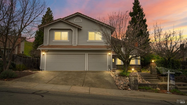 view of front of property with a garage