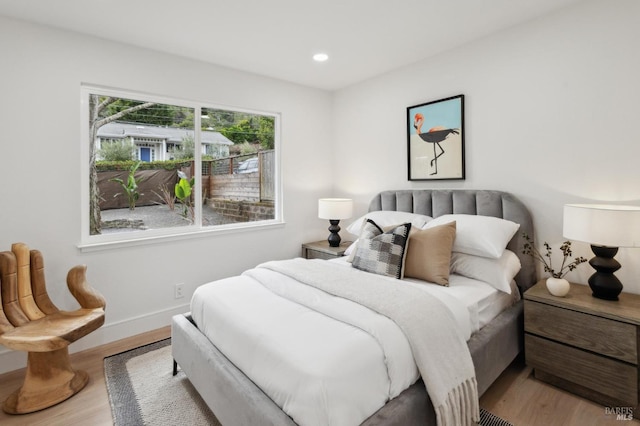 bedroom featuring hardwood / wood-style flooring