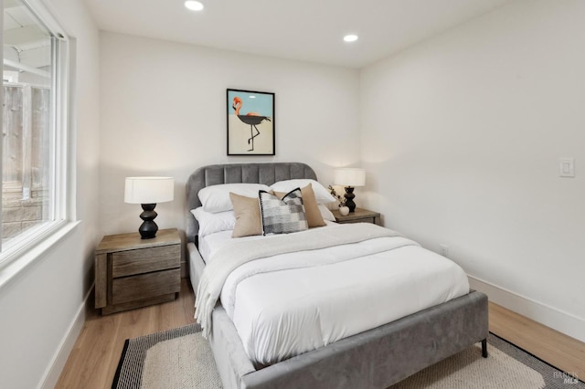 bedroom featuring light hardwood / wood-style floors