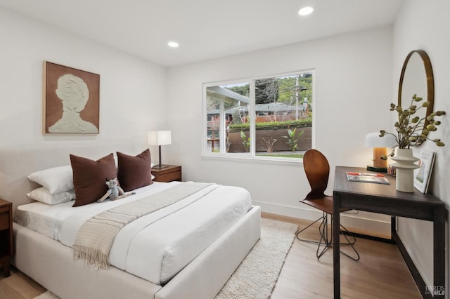 bedroom featuring light hardwood / wood-style floors