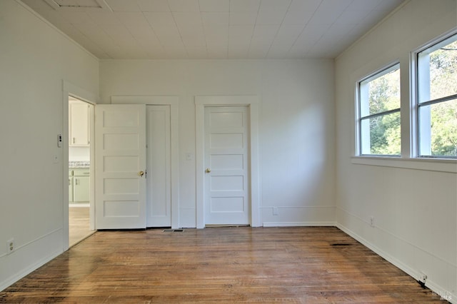 unfurnished bedroom with light wood-type flooring