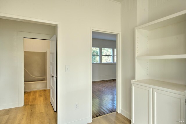 hallway featuring light hardwood / wood-style flooring