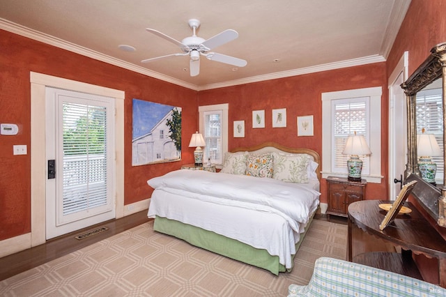 bedroom with ornamental molding, access to outside, ceiling fan, and light hardwood / wood-style floors