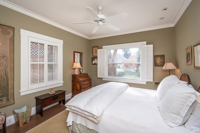 bedroom with ceiling fan, ornamental molding, and wood-type flooring