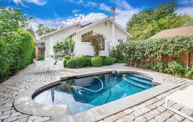 view of pool with a patio area