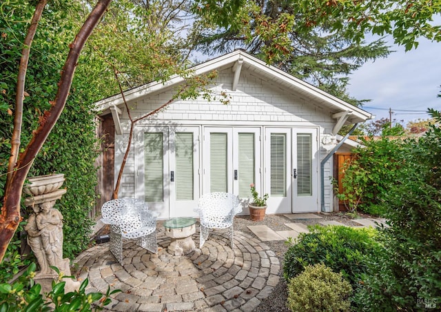 view of outdoor structure with french doors