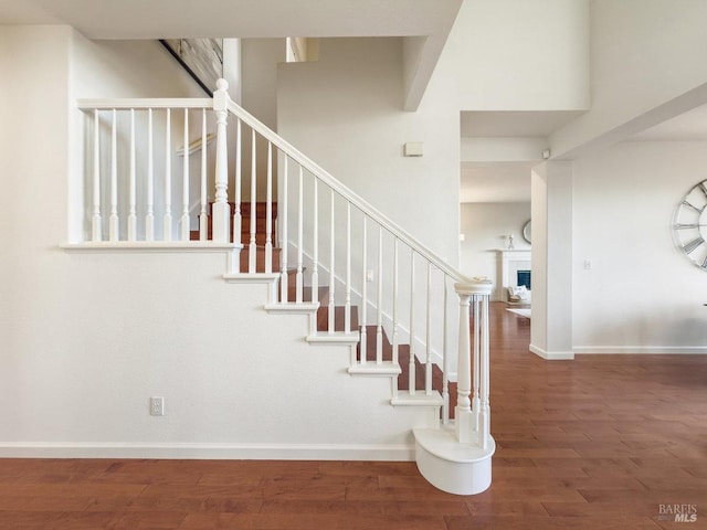 stairway with wood-type flooring