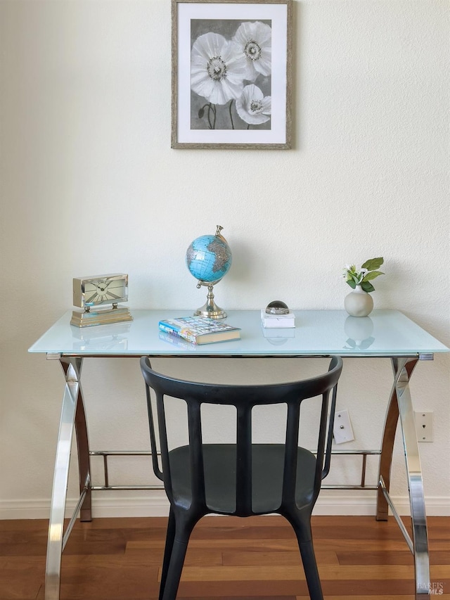 dining room with hardwood / wood-style flooring