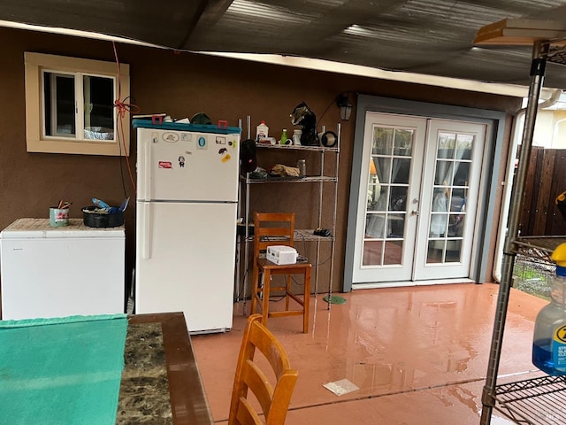 kitchen featuring fridge, white fridge, and french doors