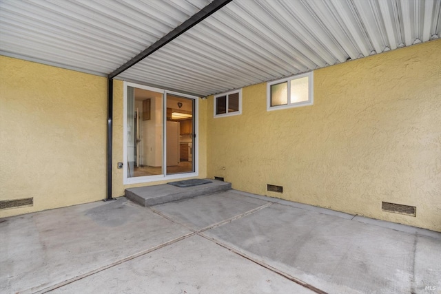 view of patio / terrace featuring visible vents