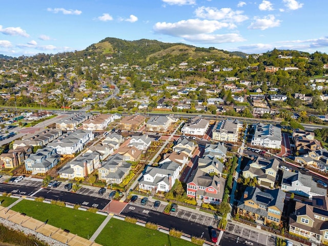 birds eye view of property featuring a mountain view