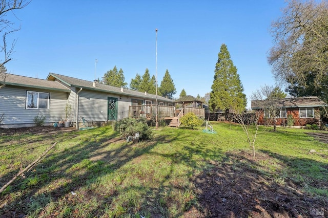 view of yard featuring a gazebo and a deck