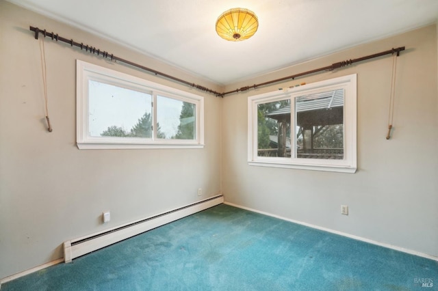 unfurnished room featuring carpet and a baseboard heating unit