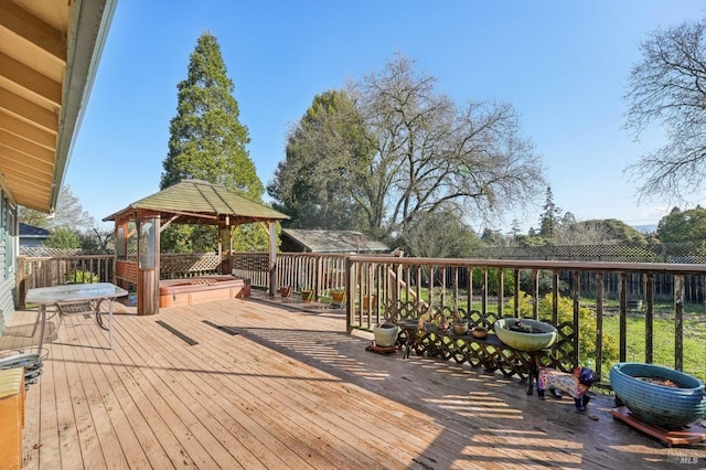 wooden deck with a gazebo