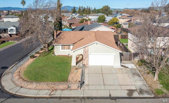 birds eye view of property with a mountain view