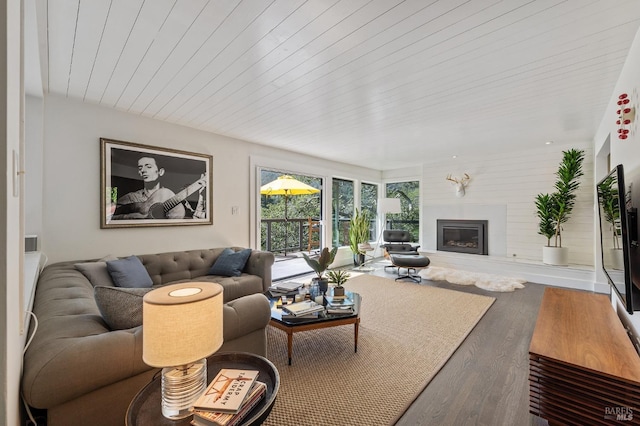 living room with wood ceiling and wood-type flooring