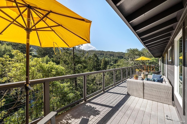 deck featuring an outdoor living space