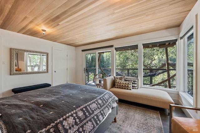 bedroom featuring wood ceiling and multiple windows