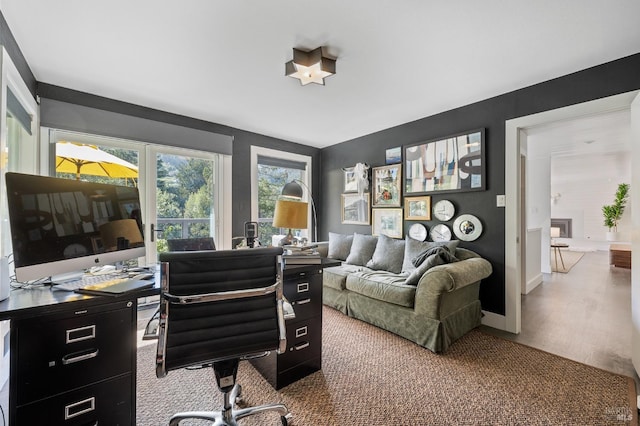 office space with wood-type flooring