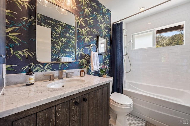 full bathroom featuring vanity, toilet, and shower / bath combo with shower curtain