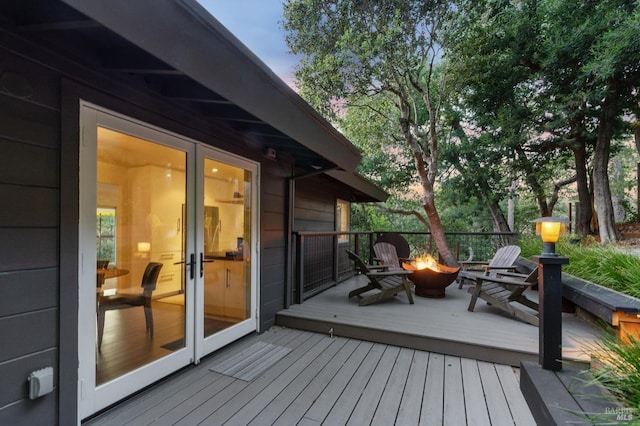 deck featuring a fire pit