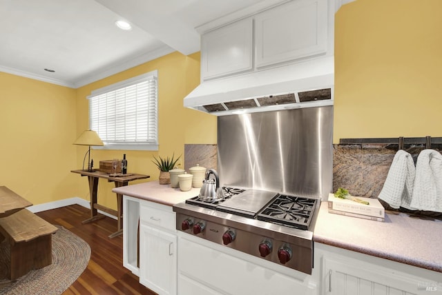 kitchen with crown molding, dark hardwood / wood-style floors, custom range hood, white cabinets, and stainless steel gas stovetop