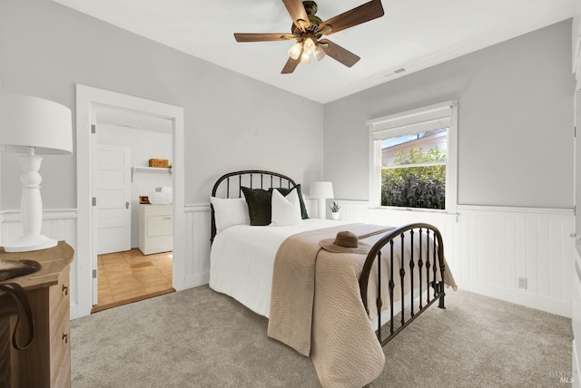 bedroom with ceiling fan, washer / clothes dryer, and carpet