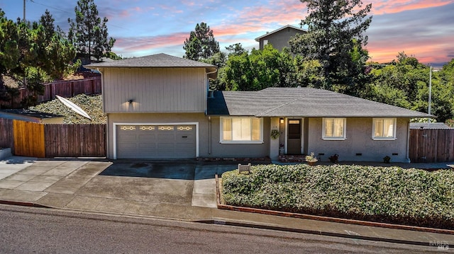 view of front of house with a garage