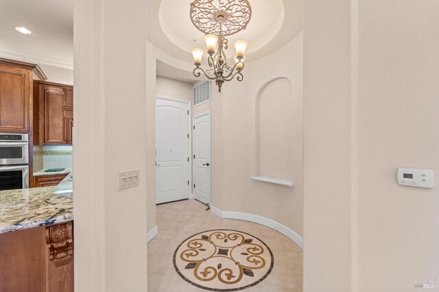 1120 Sonata Dr, Vallejo, CA 94591 - corridor with baseboards, a chandelier, recessed lighting, and light tile patterned floors