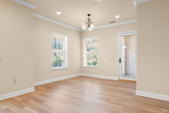 1120 Sonata Dr, Vallejo, CA 94591 - empty room featuring a chandelier, crown molding, light wood finished floors, recessed lighting, and baseboards