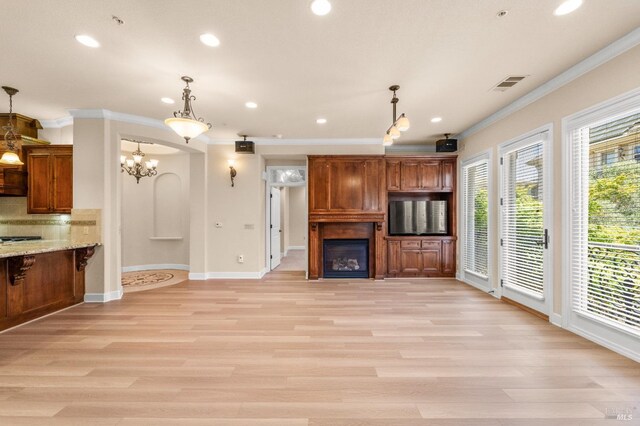 1120 Sonata Dr, Vallejo, CA 94591 - unfurnished living room featuring ornamental molding, recessed lighting, baseboards, a large fireplace, and light wood-type flooring