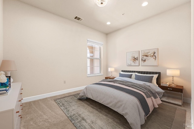 carpeted bedroom with baseboards, visible vents, and recessed lighting