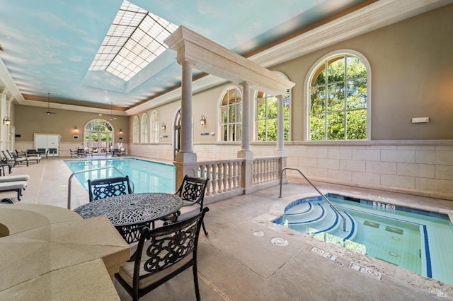 pool featuring a skylight