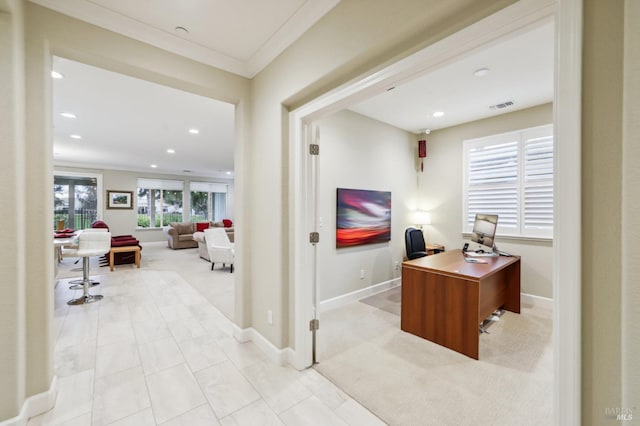 carpeted office space featuring ornamental molding